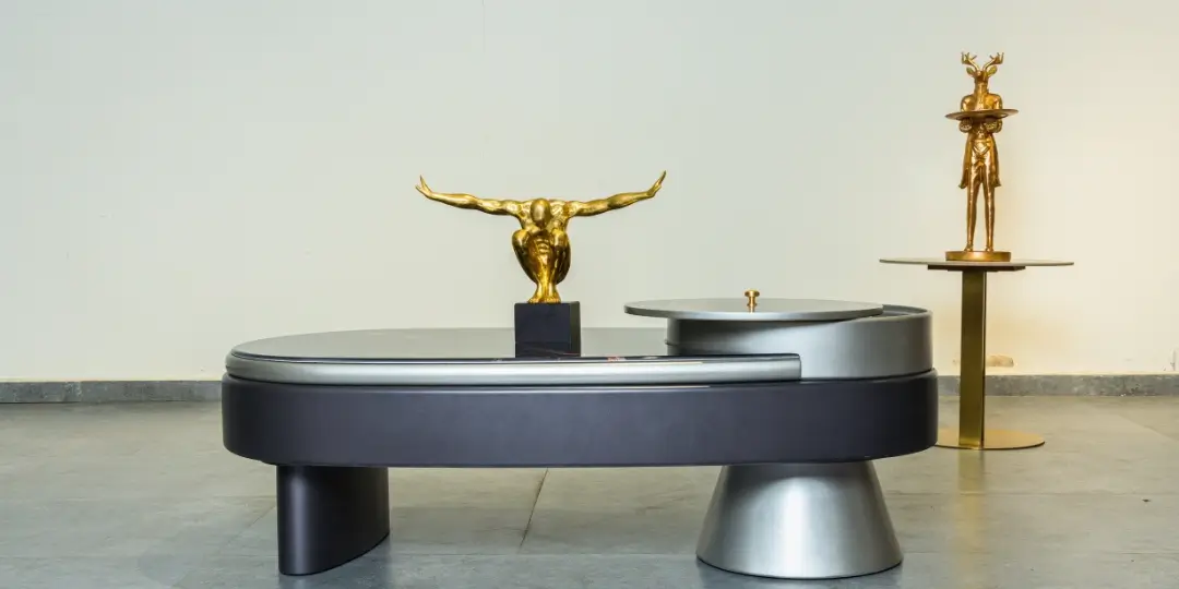 Modern metal coffee table set with gold sculpture decor