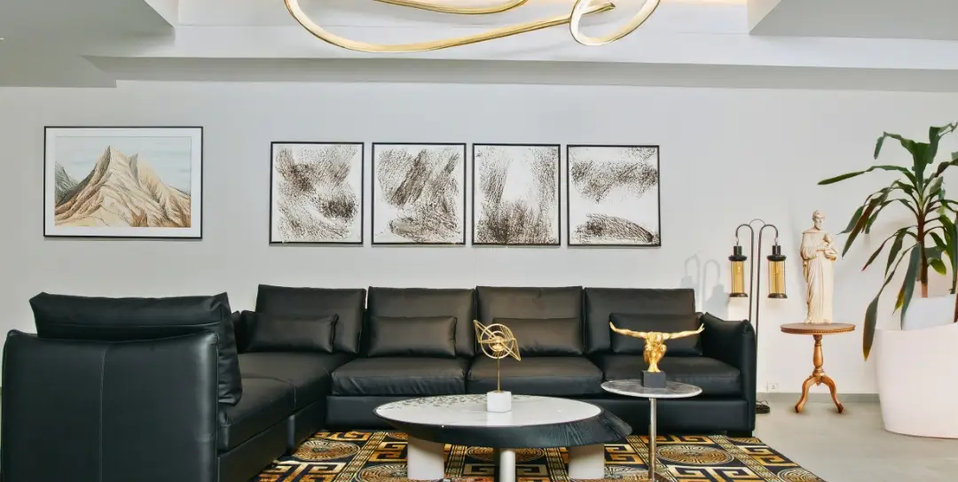 Premium black leather L-shaped sofa set with coffee table